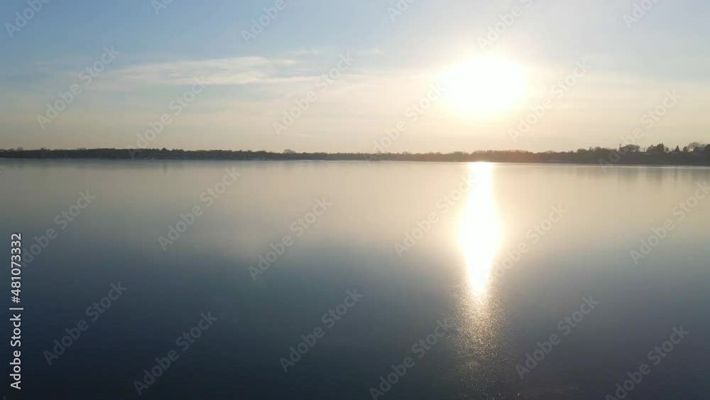 Lake Completely frozen without snow reflections on the ice aerial view Lake Completely frozen without snow reflections on the ice aerial view