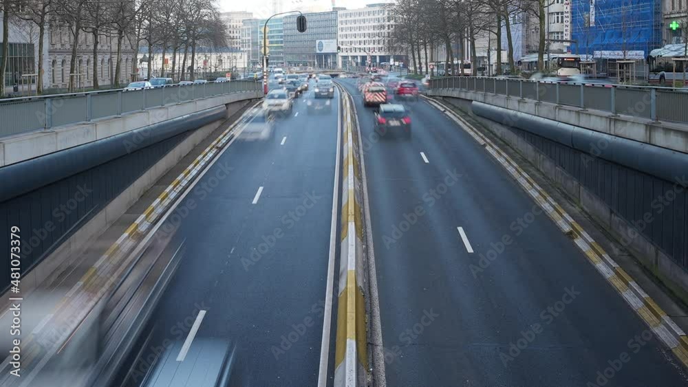 Timelapse of Hundreds of Cars passing by on Brussels ring road during rush hour. Ixelles, Belgium Timelapse of Hundreds of Cars passing by on Brussels ring road during rush hour. Ixelles, Belgium