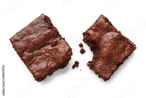 Pieces of tasty chocolate brownie isolated on white background photo