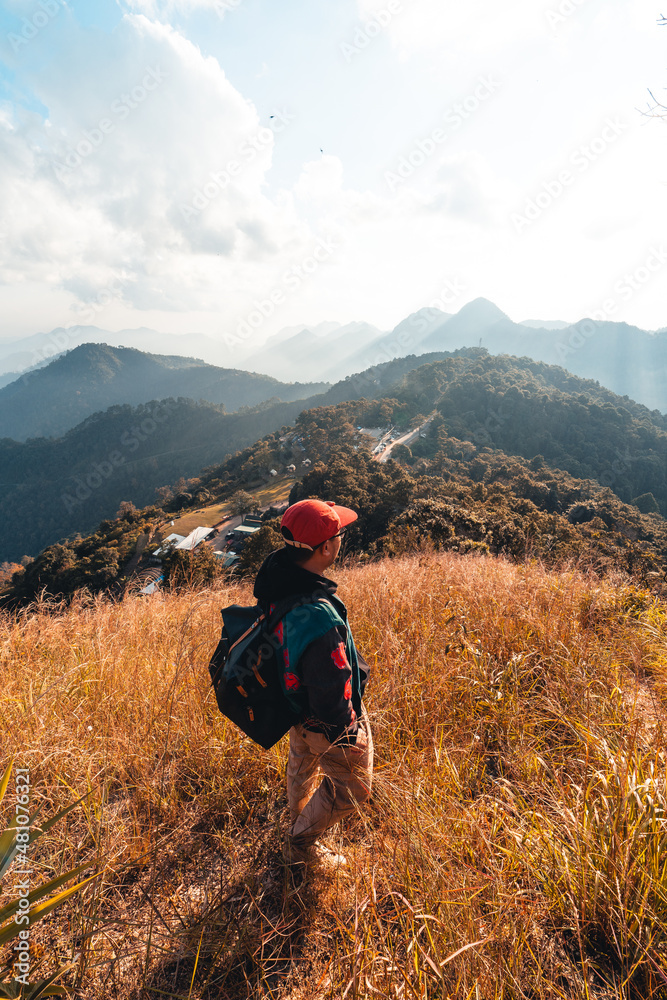 Hiking in mountains in the evening