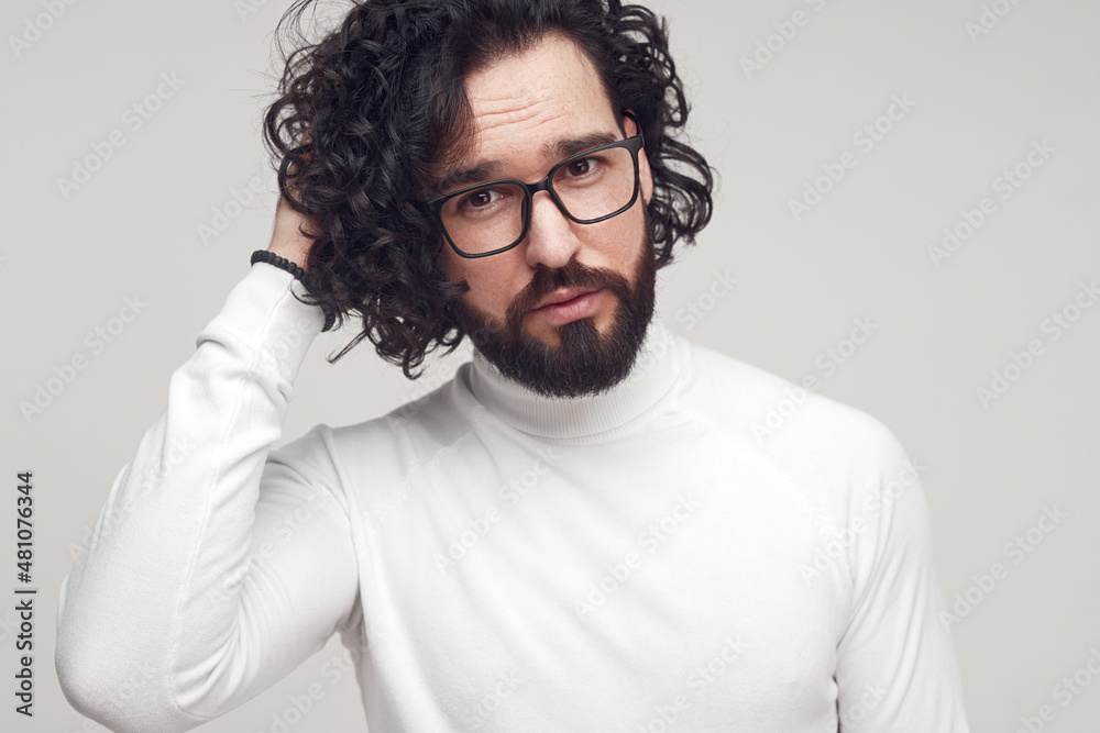 Handsome curly haired man in glasses Handsome curly haired man in glasses