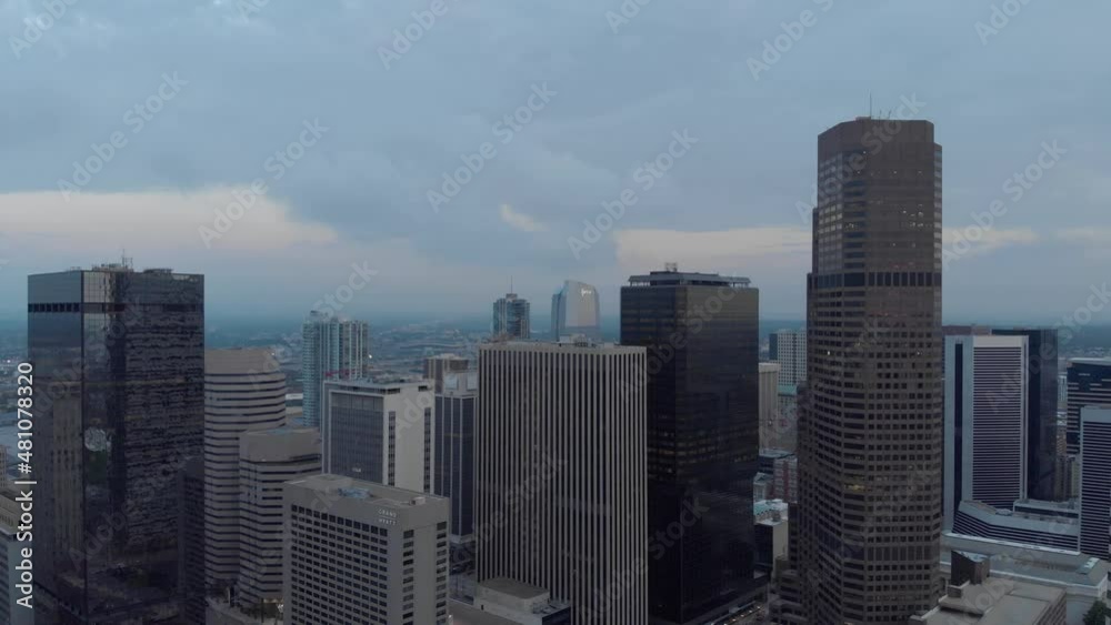 Aerial settle into downtown Denver Colorado just after sunrise and blue hour Aerial settle into downtown Denver Colorado just after sunrise and blue hour