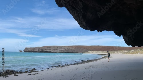 Woman admires the teal water at Playa Escamilla Guerrero photo