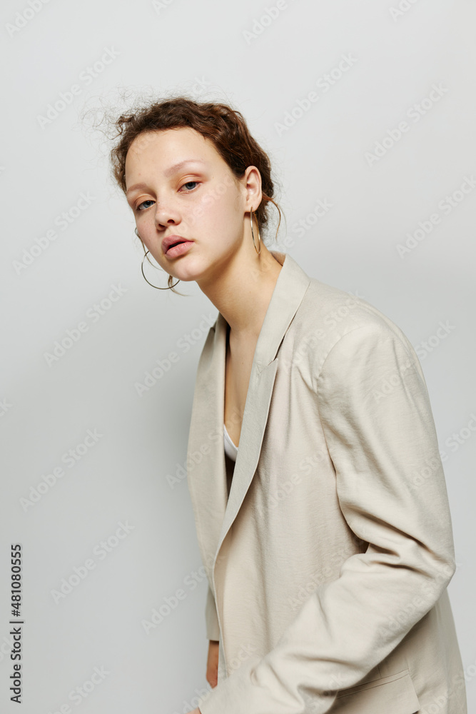 beautiful woman classic suit fashion posing fun light background unaltered beautiful woman classic suit fashion posing fun light background unaltered