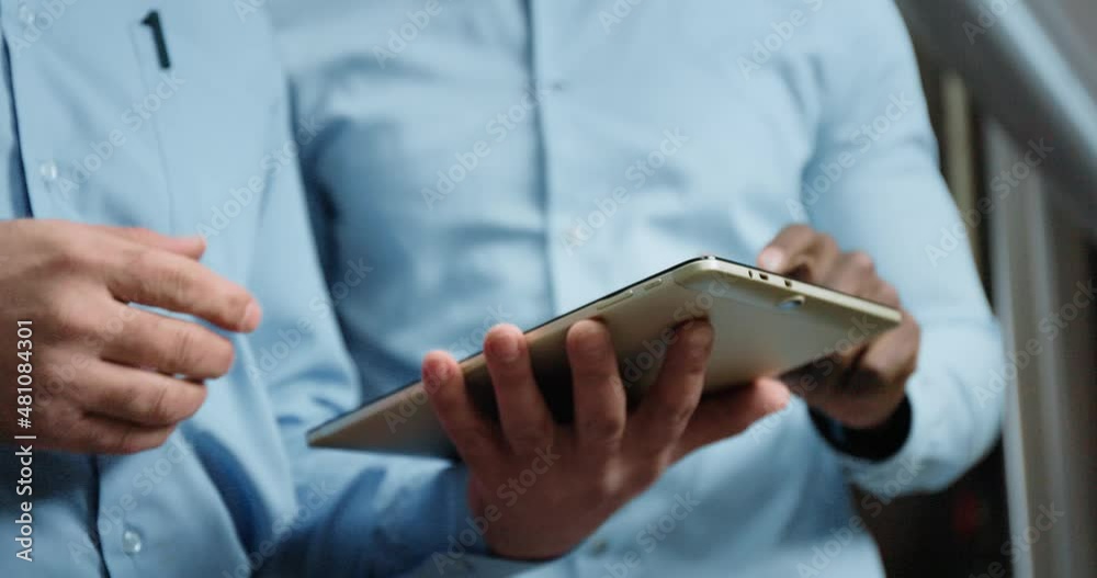 Two Industry Engineers Walk in Factory, Use Tablet and Discuss Work Two Industry Engineers Walk in Factory, Use Tablet and Discuss Work