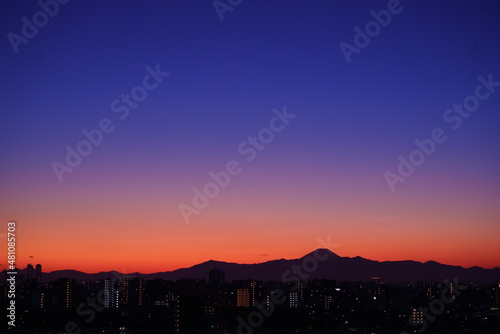 Twilight view for Mt.Fuji and skyscrapers from Tokyo