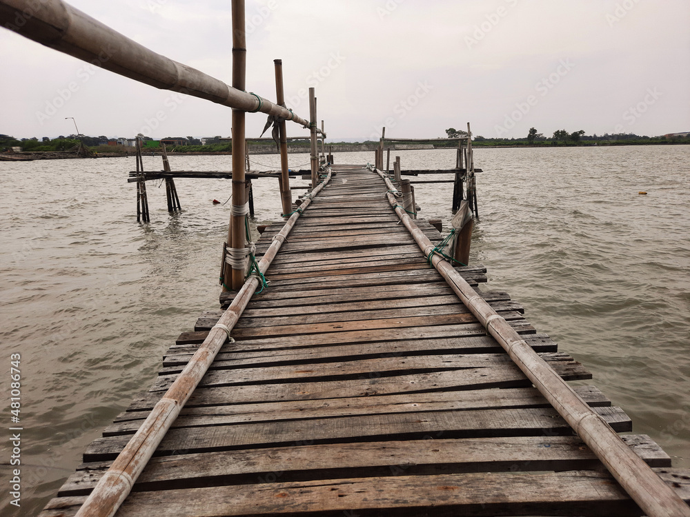 wooden pier on the beach