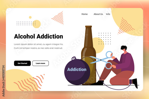 sad man drinker alcoholic holding scissors to cut metal chain addicted drunk guy having problem alcohol addiction