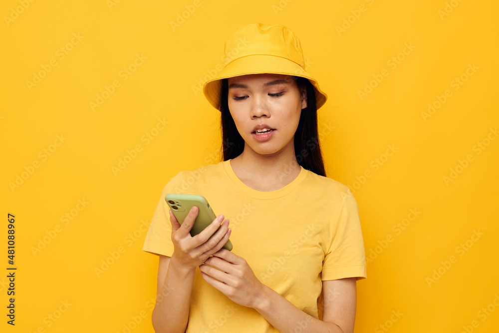 woman with Asian appearance talking on the phone posing fashion Lifestyle unaltered