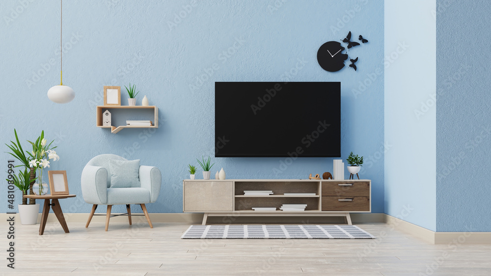 Interior mock up living room with armchair ,TV on cabinet in modern living room with lamp,table,flower and plant on wooden wall background,3d rendering Interior mock up living room with armchair ,TV on cabinet in modern living room with lamp,table,flower and plant on wooden wall background,3d rendering