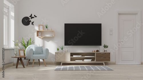 Interior mock up living room with armchair ,TV on cabinet in modern living room with lamp,table,flower and plant on wooden wall background,3d rendering