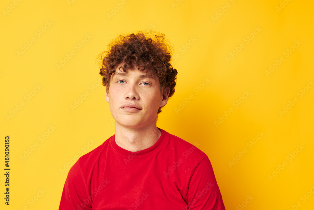 guy with red curly hair emotions red t-shirt hat studio yellow background unaltered guy with red curly hair emotions red t-shirt hat studio yellow background unaltered