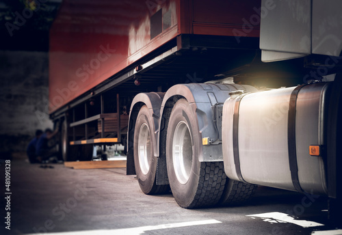 Semi Trailer Truck the Parking Maintenance Truck Wheels Tires. Fuel Tank Truck. Industry Cargo Freight Trucks Transport.