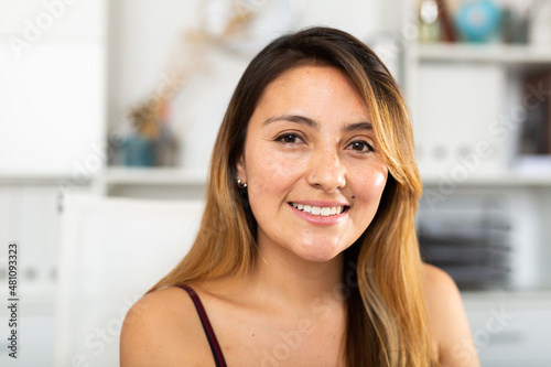 Free Download Portrait of young smiling latina business woman in office - GFXLoad