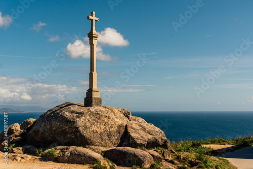 Cross at Cabo Finisterre, in Galicia, Spain. End of the famous Way of St. James. photo