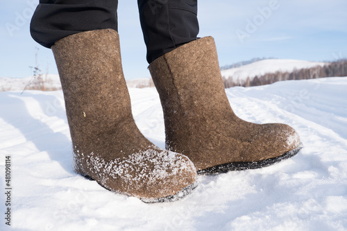 Wallpaper Mural russian black felt boots in the snow Torontodigital.ca