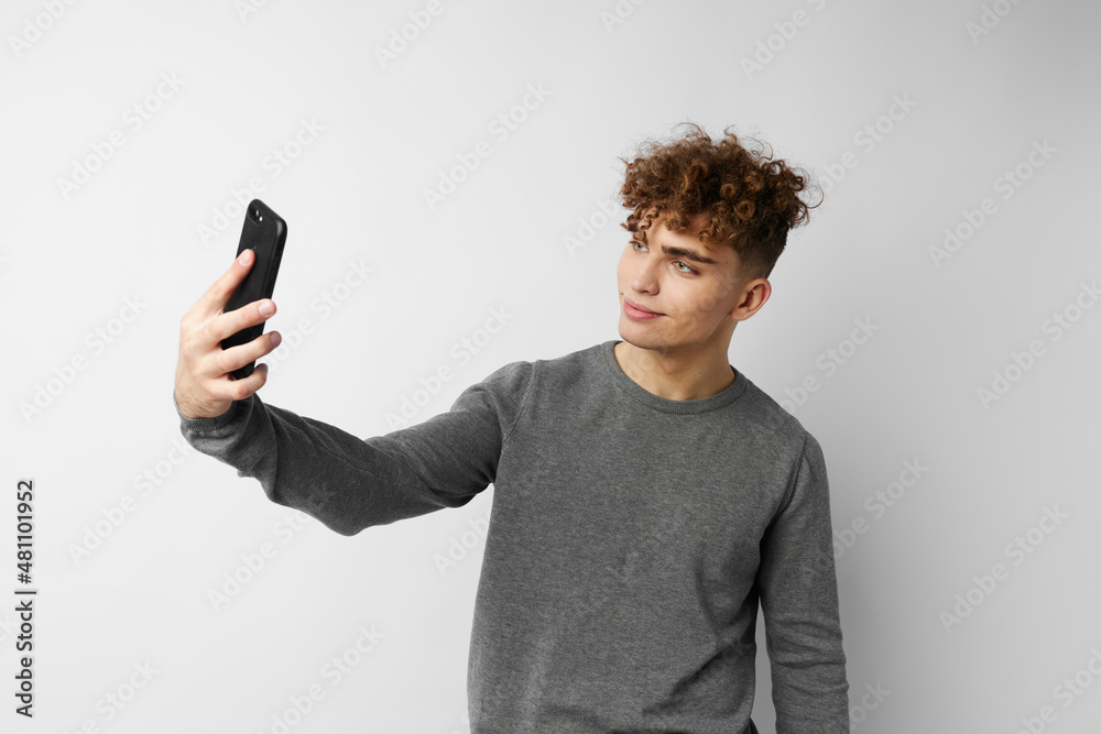 kinky guy technology with phone selfie isolated background kinky guy technology with phone selfie isolated background
