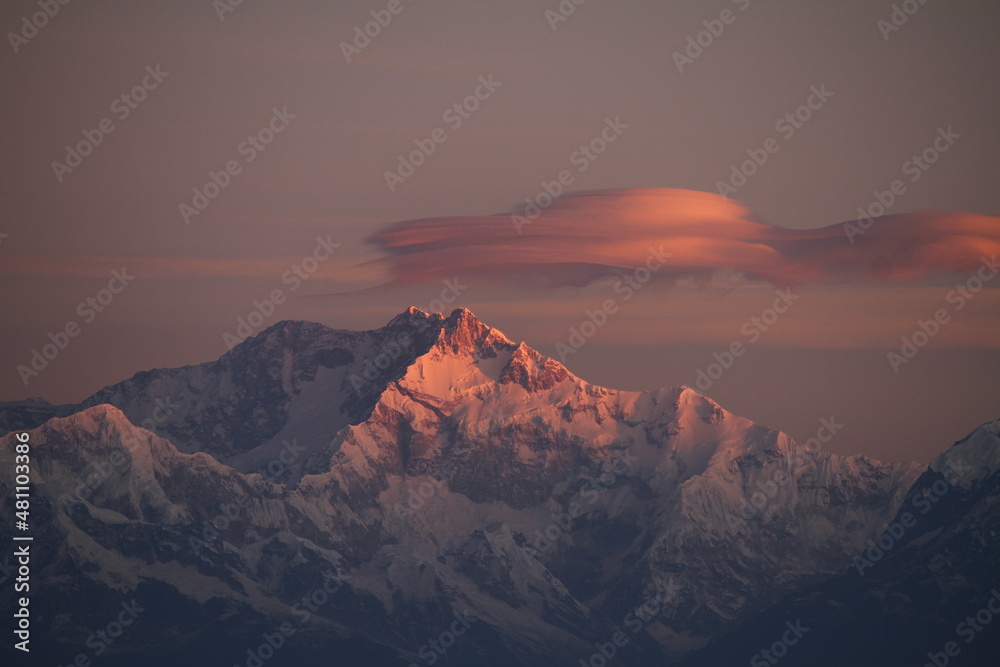 Dawns first glimpse reflected on the mighty Mt. Kanchenjunga. The highest peak of the Himalayan range in India.
Taken from one of the top most points of Darjeeling , India at Tiger Hill view point. 