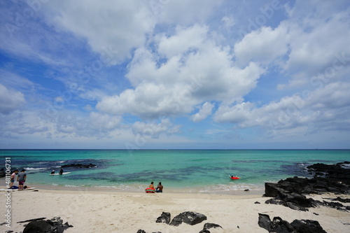 clear shoaling beach and charming clouds