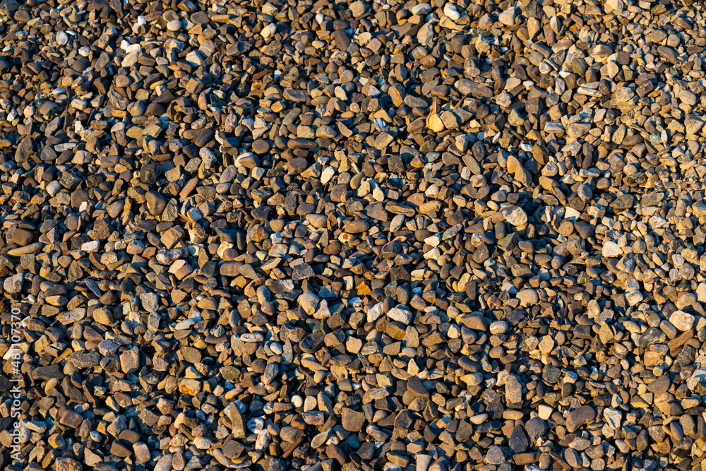 small bright pebbles and gravel as background or texture small bright pebbles and gravel as background or texture