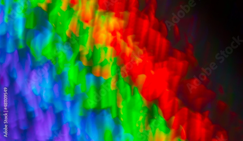 Rainbow colored abstract background. Beautiful colorful neon color texture. Holographic background. Rainbow background. LGBT flag movement, gay parade homosexuality and transgender rights.
