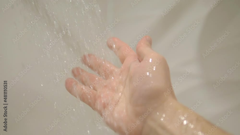 Water falling on the hand in slow motion 180fps Water falling on the hand in slow motion 180fps