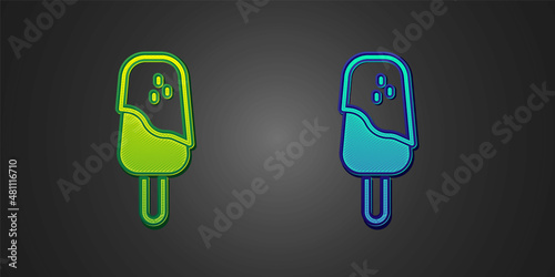 Green and blue Ice cream icon isolated on black background. Sweet symbol. Vector