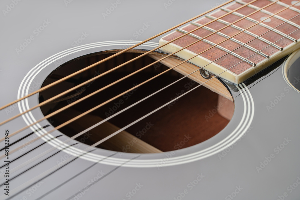 Obraz premium black new guitar strings closeup