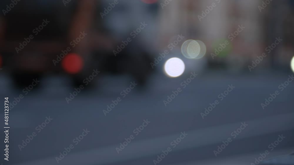 Out of focus beautiful glittering blurred bokeh of cars and traffic lights. Blurred city traffic jam on city street. defocused colorful lights of traffic jam in city street Out of focus beautiful glittering blurred bokeh of cars and traffic lights. Blurred city traffic jam on city street. defocused colorful lights of traffic jam in city street