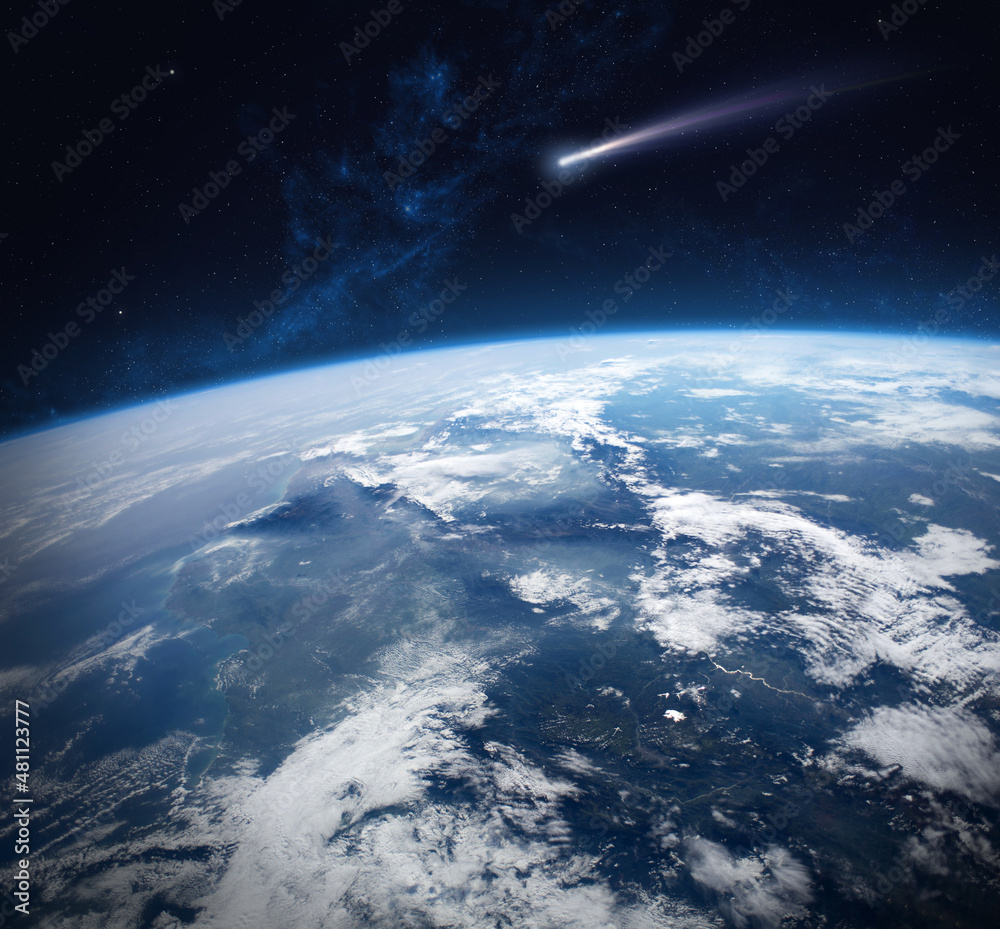 Comet and Earth. Elements of this image are furnished by NASA.