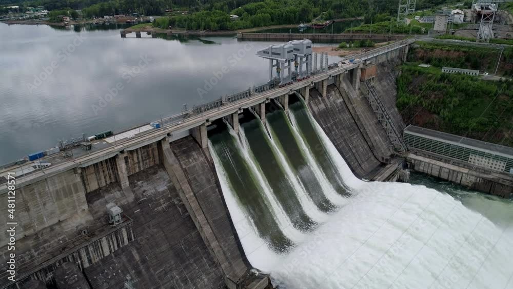 Aerial view of water discharge at hydroelectric power plant Aerial view of water discharge at hydroelectric power plant
