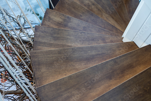 Stampa su Tela architecture background wooden spiral staircase