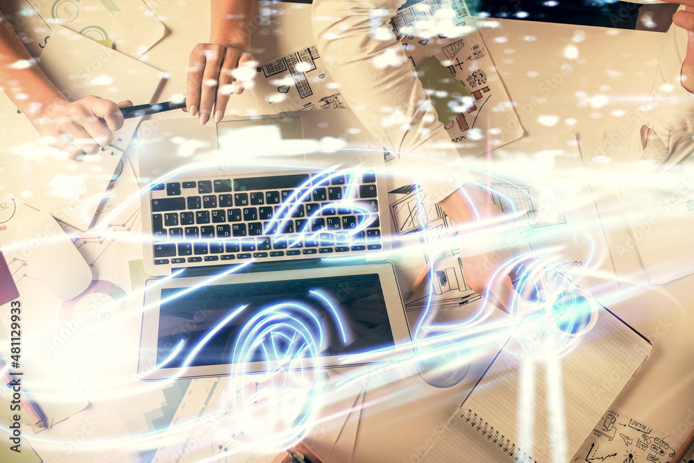 Double exposure of man and woman working together and a car hologram drawing. Autopilot concept. Computer background. Double exposure of man and woman working together and a car hologram drawing. Autopilot concept. Computer background.