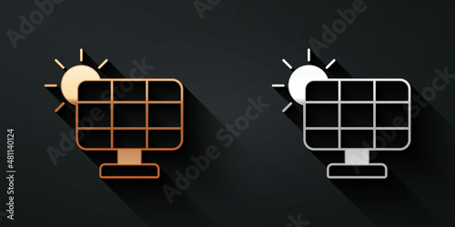 Gold and silver Solar energy panel icon isolated on black background. Long shadow style. Vector