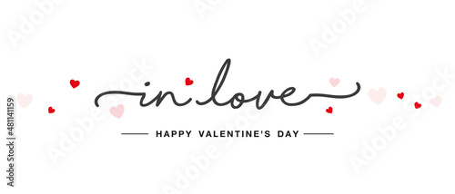 In love beautiful handwritten typography calligraphy with some red and pink hearts