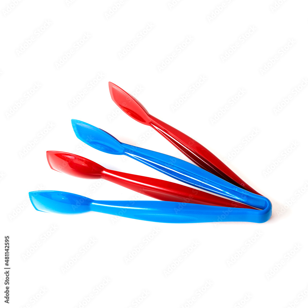 Tongs for meat on a white isolated background. Tongs for meat on a white isolated background.