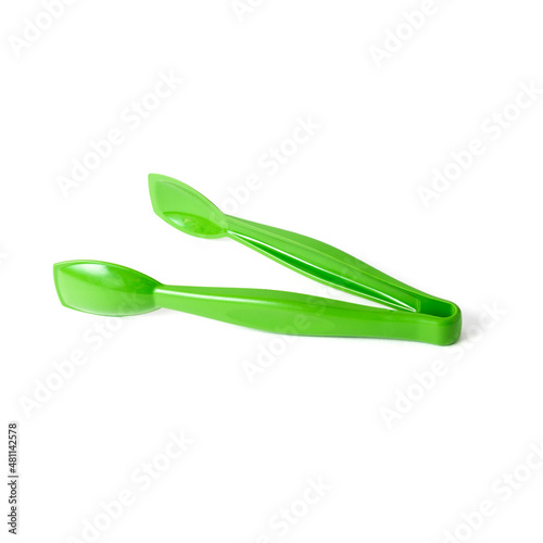 Tongs for meat on a white isolated background.