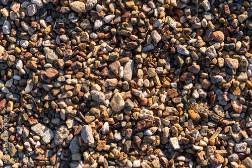 Small stone texture for background. Smooth round pebbles texture background. 