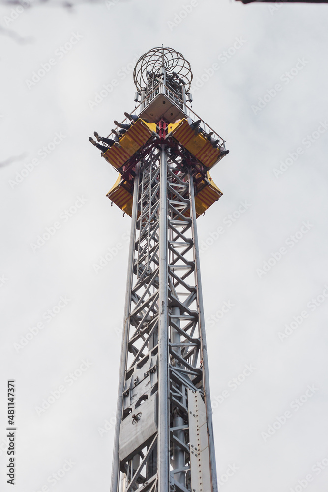 Breathtaking attraction in an amusement park - fear and screams of people from strong emotions Breathtaking attraction in an amusement park - fear and screams of people from strong emotions