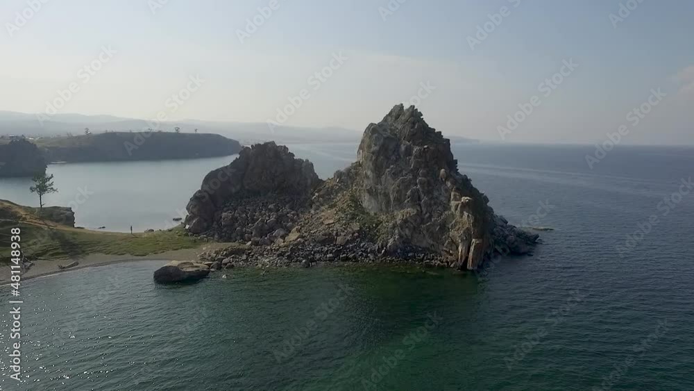 ProRes. Lake Baikal. Olkhon Island. The heart of the island is Shamanka Rock. Poleslok Khuzhir. Summer shooting from a drone. ProRes. Lake Baikal. Olkhon Island. The heart of the island is Shamanka Rock. Poleslok Khuzhir. Summer shooting from a drone.