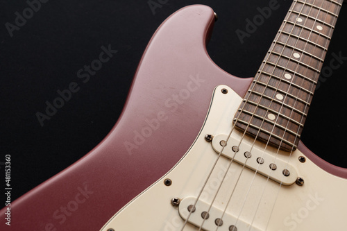 Canvas Print Close up of a Stratocaster USA electric guitar in lila
