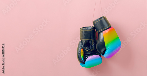 Boxing gloves in the colors of the LGBT rainbow flag. Fight for your rights concept. Template Copy space for text. mock-up