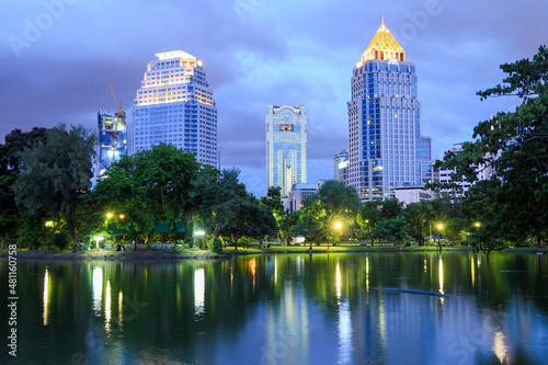 Lumphini Park  Bangkok  Thailand. View of modern buildings from the beautiful park in the center of the city.