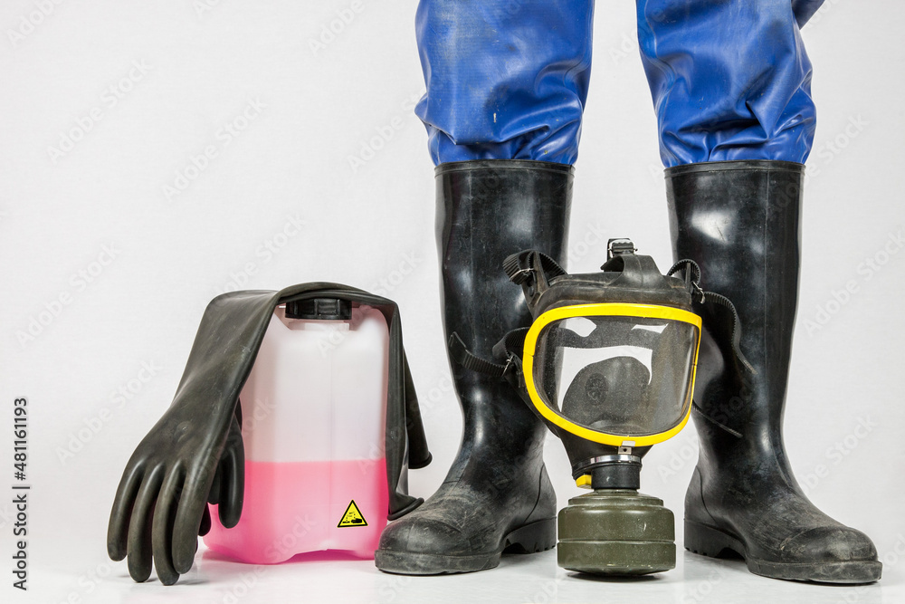 Five things for industrial cleaning. industrial cleaners, rubber gloves,  rubber boots, gas mask and protective suit. Stock 写真 | Adobe Stock