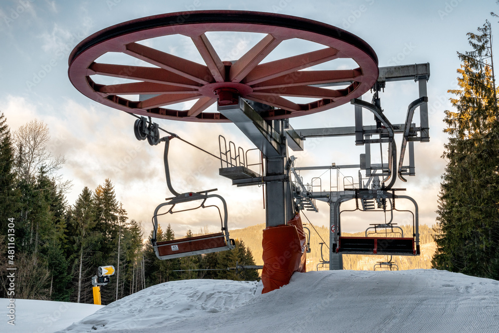 Empty seats at skilift in winter resort. Empty seats at skilift in winter resort.