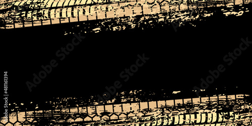 Tire tracks on dirt asphalt road, gold abstract ink grunge texture of car or bike