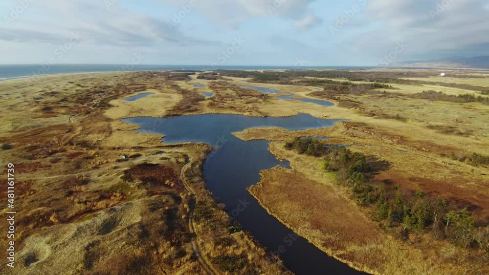Panoramic viewof the sea coast, sand dunes, lakes from aerial view. A tourist destination for traveling. Panoramic viewof the sea coast, sand dunes, lakes from aerial view. A tourist destination for traveling.