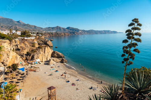 Fototapeta Naklejka Na Ścianę i Meble -  Calahonda beach in the town of Nerja one spring afternoon, Andalusia. Spain. Costa del sol in the Mediterranean Sea.