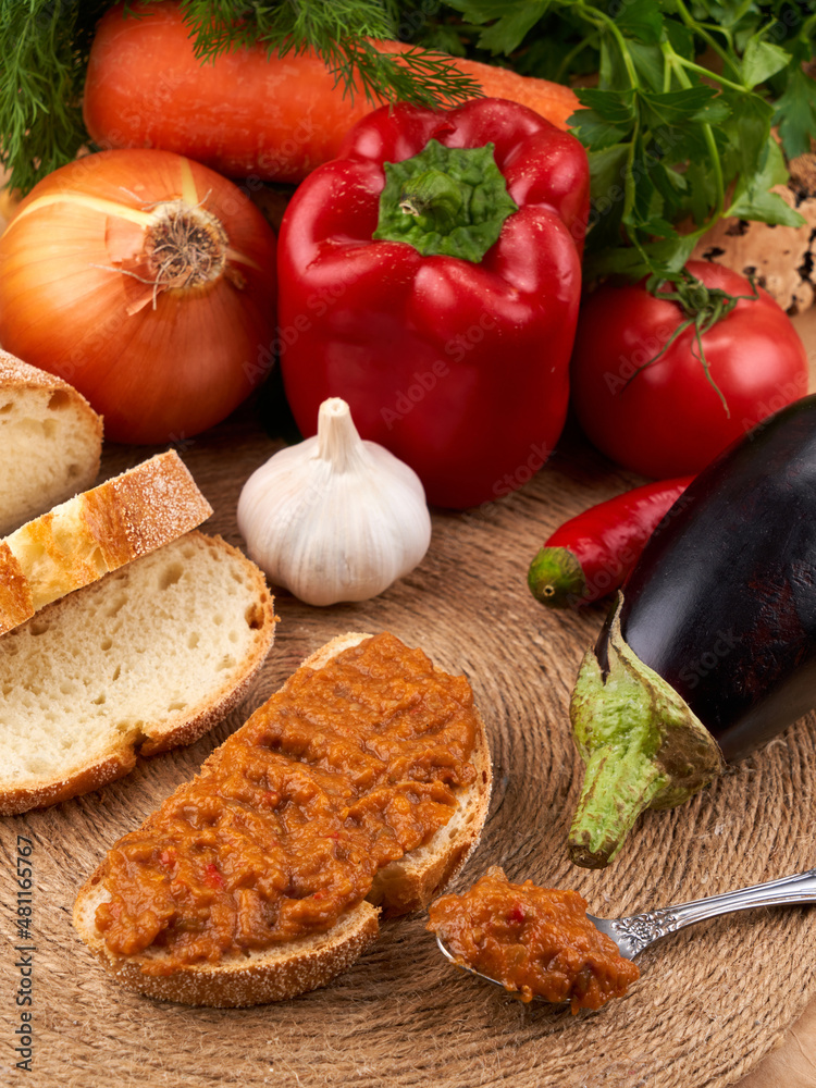 Sandwich with squash caviar, table setting with vegetables Sandwich with squash caviar, table setting with vegetables