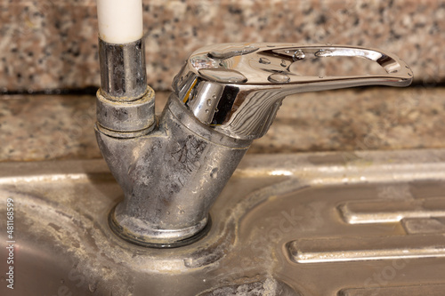 Photography Faucet with limescale